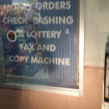 Jolly Spirits - a vending machine in front of a store window - Beer, Wine & Spirits Near Me - Port Hueneme, California