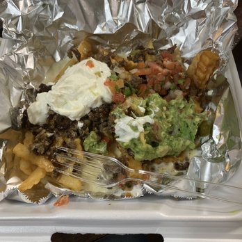 Las Tapatias - Carne asada fries (already dug in) - Mexican Near Me - Killeen, Texas Las Tapatias - Carne asada fries (already dug in) - Mexican Near Me - Killeen, Texas
