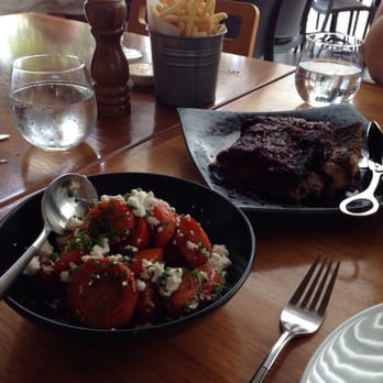Coast Restaurant & Bar - The chips in the background are really good and come with aioli - Restaurants Near Me - Hervey Bay, QLD Coast Restaurant & Bar - The chips in the background are really good and come with aioli - Restaurants Near Me - Hervey Bay, QLD