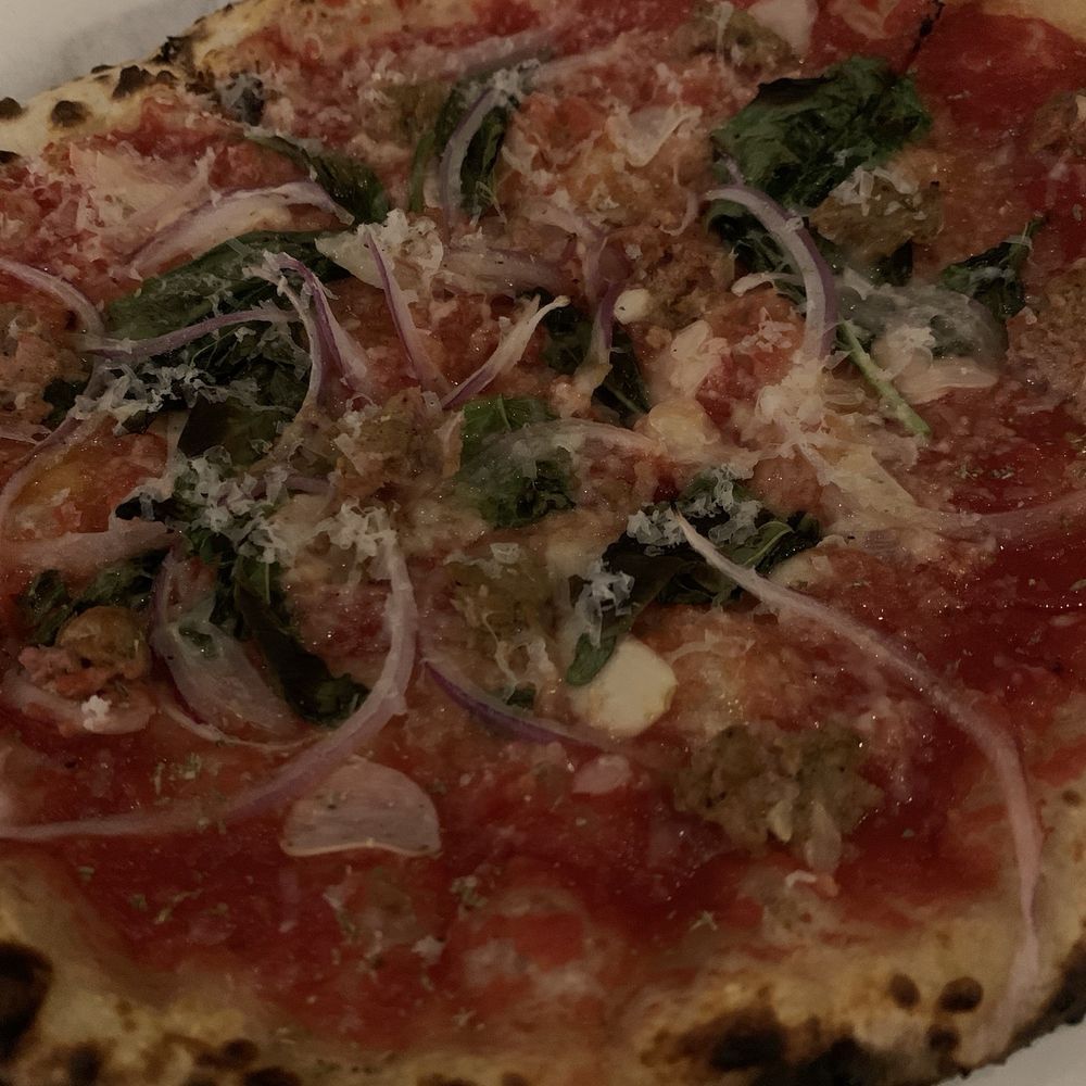 Sicilian Sunburn pizza w/ sausage and red onions