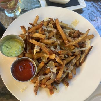 Riverpark Terrace - Truffle parm fries with aged cheese sauce - Bars Near Me - New Smyrna Beach, Florida