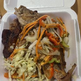 Whole snapper, rice and beans with plantains. Whole snapper, rice and beans with plantains.
