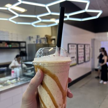 Swirl Dessert Bar - Pick-Me-Up Shake at Swirl. Vanilla ice cream blended with cookie dough, coffee powder, and caramel sauce. - Ice Cream & Frozen Yogurt Near Me - Charlotte, North Carolina Swirl Dessert Bar - Pick-Me-Up Shake at Swirl. Vanilla ice cream blended with cookie dough, coffee powder, and caramel sauce. - Ice Cream & Frozen Yogurt Near Me - Charlotte, North Carolina