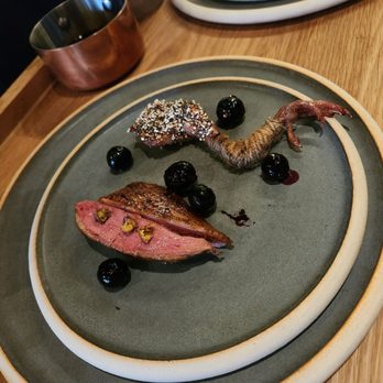 Lilo - Dry Aged Squab: burnt vanilla oil, preserved green juniper berries, puffed amaranth, charred Blueberry - Seafood Near Me - Carlsbad, California Lilo - Dry Aged Squab: burnt vanilla oil, preserved green juniper berries, puffed amaranth, charred Blueberry - Seafood Near Me - Carlsbad, California
