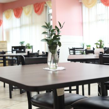 Danie’s Restaurant - Interior view of Danie's Restaurant showing the front counter, comfortable table seating, and bright dining space. - Haitian Near Me - East Orange, New Jersey Danie’s Restaurant - Interior view of Danie's Restaurant showing the front counter, comfortable table seating, and bright dining space. - Haitian Near Me - East Orange, New Jersey