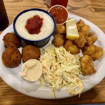 Beedos - Fried Shrimp Platter - shrimp, grits with tomatoes, jalapeño hush puppies, cinnamon honey butter, coleslaw - American Near Me - Saint Helena Island, South Carolina Beedos - Fried Shrimp Platter - shrimp, grits with tomatoes, jalapeño hush puppies, cinnamon honey butter, coleslaw - American Near Me - Saint Helena Island, South Carolina