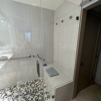 Alpha Regional - a walk in shower with a glass door - General Contractors Near Me - Tustin, California Alpha Regional - a walk in shower with a glass door - General Contractors Near Me - Tustin, California