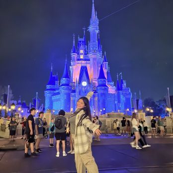 Walt Disney World® Resort - My daughter in front of Cinderella's castle - Amusement Parks Near Me - Orlando, Florida