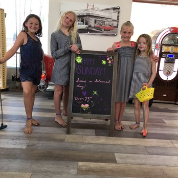 Plaza Beach Hotel - Beachfront Resort - The girls just finished the daily sign. - Hotels Near Me - St. Pete Beach, Florida