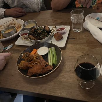 Eureka! - wings by the pound, brussels sprouts, corn dog pops, truffle cheese fries, stout beer, wild child - American Near Me - Redlands, California Eureka! - wings by the pound, brussels sprouts, corn dog pops, truffle cheese fries, stout beer, wild child - American Near Me - Redlands, California