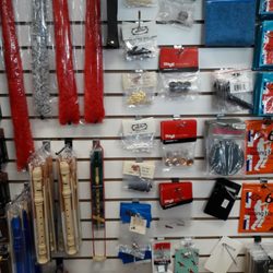 Wholesale Music Instruments - Guitar parts, cleaning cloths, recorders, and saxophone pad savers.