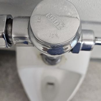 Tankless Support Plumbing - Repairing urinal. - Plumbing Near Me Tankless Support Plumbing - Repairing urinal. - Plumbing Near Me