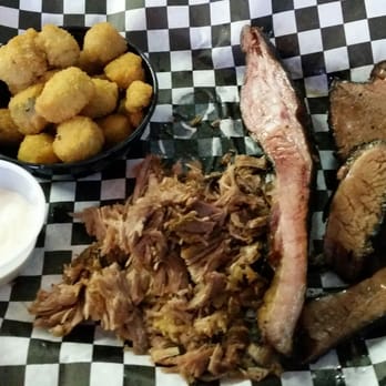 Elmer's BBQ - From top left clockwise: fried okra, pork spare rin, beef brisket, and pulled pork - Barbeque Near Me - Tulsa, Oklahoma