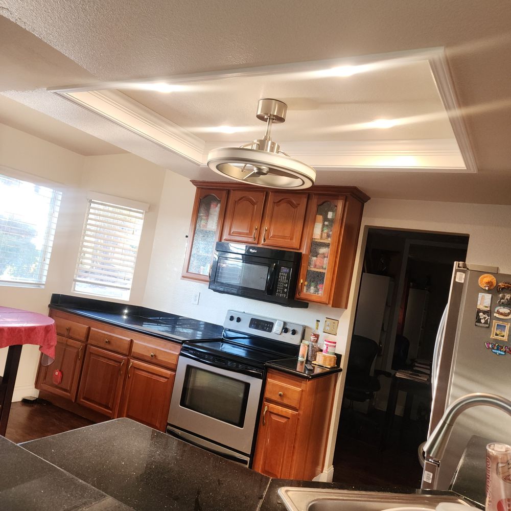 New kitchen ceiling, lights and ceiling fan.