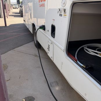 Indie Campers - Phoenix - The cord from the generator to the rig for electricity. The generator does not have enough power to run the Ac or enough gas - RV Rental Near Me - Phoenix, Arizona Indie Campers - Phoenix - The cord from the generator to the rig for electricity. The generator does not have enough power to run the Ac or enough gas - RV Rental Near Me - Phoenix, Arizona
