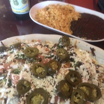 Lupita's Restaurant - Carnitas Nachos, side of rice and beans. - Mexican Near Me - New York, New York Lupita's Restaurant - Carnitas Nachos, side of rice and beans. - Mexican Near Me - New York, New York