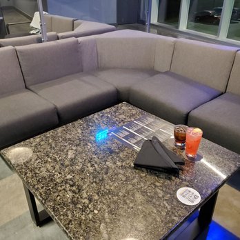 Topgolf - Bay lounge seating - Golf Near Me - San Jose, California Topgolf - Bay lounge seating - Golf Near Me - San Jose, California
