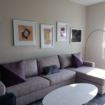 Celeste Hotel - Living room with a huge sofa/pull-out bed - Hotels Near Me - Orlando, Florida