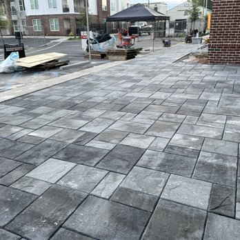 Lawn Vets Outdoors - a brick patio being laid - Landscaping Near Me Lawn Vets Outdoors - a brick patio being laid - Landscaping Near Me