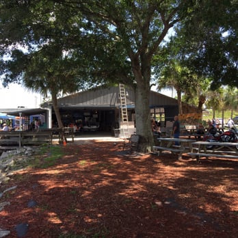 Twister Airboat Rides - Seating available under the shade tree, with no table service. - Seafood Near Me - Cocoa, Florida Twister Airboat Rides - Seating available under the shade tree, with no table service. - Seafood Near Me - Cocoa, Florida