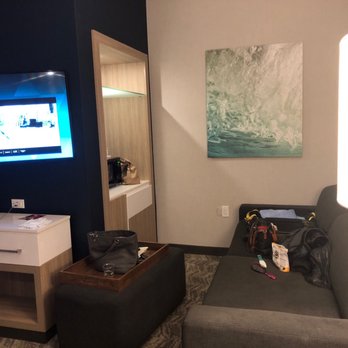 SpringHill Suites by Marriott The Dunes On Monterey Bay - This is the set up. Cannot pull out television so it faces couch. The couch stares at the microwave. - Hotels Near Me - Marina, California