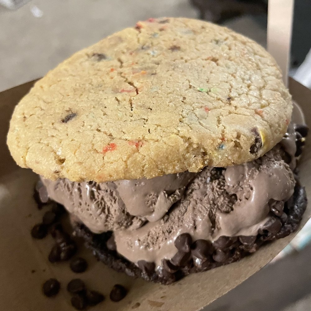 a chocolate chip cookie ice cream sandwich a chocolate chip cookie ice cream sandwich