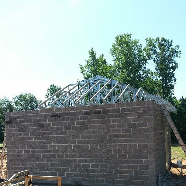 Slide of Patch Adams Roofing