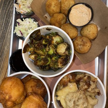 Mighty Quinn's Barbeque - Corn fritters, Mac and cheese bites, bread pudding, coleslaw and Brussel sprouts - Barbeque Near Me - Tampa, Florida