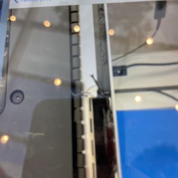 Computer Doctors - Poor job sealing the computer - A laptop keyboard with several missing keys and exposed internal parts, possibly undergoing repair or disassembly. - IT Services & Computer Repair Near Me - Los Angeles, California