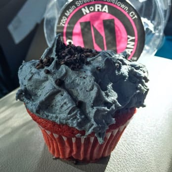NoRA Cupcake Company - Zombie cupcake (vegan). Red velvet cake, buttercream frosting, Oreo topping and a superb green white chocolate ganache filling. - Cupcakes Near Me - Middletown, Connecticut NoRA Cupcake Company - Zombie cupcake (vegan). Red velvet cake, buttercream frosting, Oreo topping and a superb green white chocolate ganache filling. - Cupcakes Near Me - Middletown, Connecticut