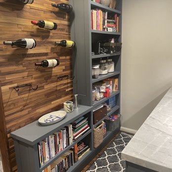 Greg Martin Cabinet Maker - a wine rack in the kitchen - General Contractors Near Me Greg Martin Cabinet Maker - a wine rack in the kitchen - General Contractors Near Me