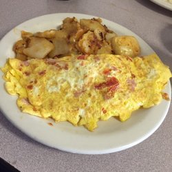 Big eating Greek omelette