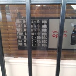 Abelina's Mexican Grill - The store hours. There are bars on the door in case you get so hungry you want to break in.