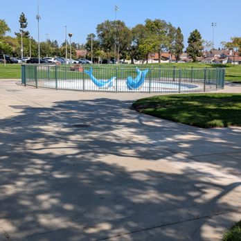 Cerritos Park East - Dolphins inside the circular fence - Tennis Near Me - Cerritos, California Cerritos Park East - Dolphins inside the circular fence - Tennis Near Me - Cerritos, California