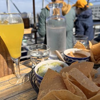 El Techo - Mimosa with chips and guacamole and salsa - Latin American Near Me - San Francisco, California El Techo - Mimosa with chips and guacamole and salsa - Latin American Near Me - San Francisco, California