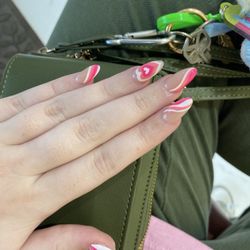 Nail Spa - Acrylic nails with pink and white designs