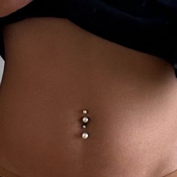 Lyons Den Tattoo - belly piercing - Tattoo Near Me - McKinney, Texas