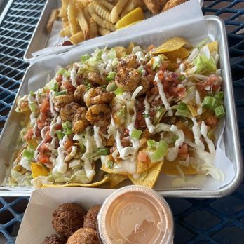Safe Harbor Seafood - Shrimp nachos Hush puppies Fried grouper and fries - Seafood Near Me - Jacksonville, Florida Safe Harbor Seafood - Shrimp nachos Hush puppies Fried grouper and fries - Seafood Near Me - Jacksonville, Florida