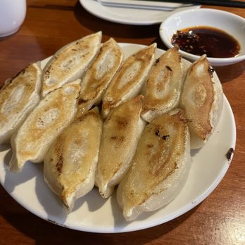 Mother's Dumplings - Pork and bok choi pan fried dumplings. - Chinese Near Me - Toronto, Ontario Mother's Dumplings - Pork and bok choi pan fried dumplings. - Chinese Near Me - Toronto, Ontario