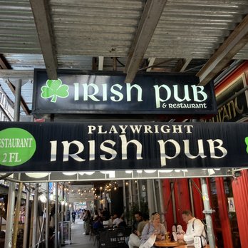 Playwright Irish Pub - people sitting at tables outside - Irish Near Me - New York, New York Playwright Irish Pub - people sitting at tables outside - Irish Near Me - New York, New York