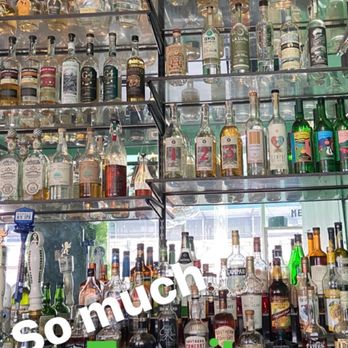 Mexicue - Midtown - Tequila wall - Mexican Near Me - New York, New York Mexicue - Midtown - Tequila wall - Mexican Near Me - New York, New York