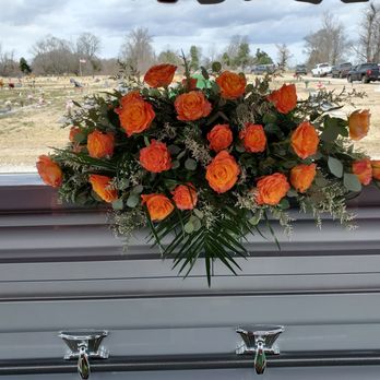 Fit For A Queen Florist - Deluxe Casket Spray with Orange Crush Roses. - Florists Near Me Fit For A Queen Florist - Deluxe Casket Spray with Orange Crush Roses. - Florists Near Me