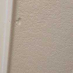 American Master Movers - Dent in drywall