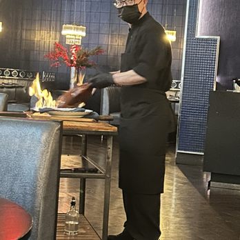 Hutong - Chef Flaming a Peking Duck Table-side - Dim Sum Near Me - New York, New York Hutong - Chef Flaming a Peking Duck Table-side - Dim Sum Near Me - New York, New York