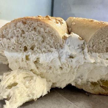 New Garden Bagel - Sesame Bagel with Jalapeño Spread - Bagels Near Me - Greensboro, North Carolina New Garden Bagel - Sesame Bagel with Jalapeño Spread - Bagels Near Me - Greensboro, North Carolina