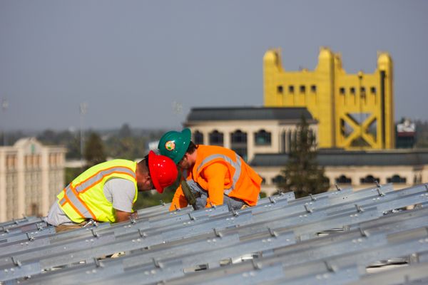 Photo of SunSystem Technology - Rancho Cordova, CA, US. SunSystem Technology working on the solar power system installed at Sacramento's Golden 1 Center.