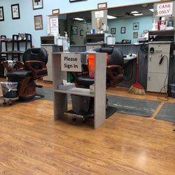 Metropolitan Barber Shop - No reservations needed - walk in and sign in.