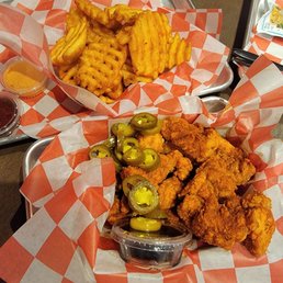 Chicken bites and waffle fries. Chicken bites and waffle fries.