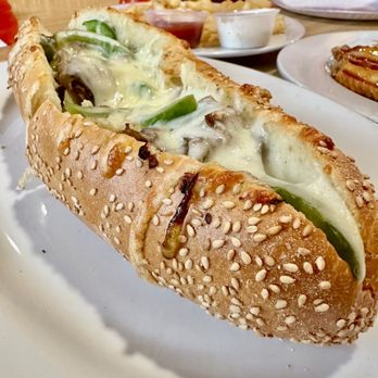 Tina's Pizza Cafe & Restaurant - Tina's infamous cheesesteak sandwich on a toasted sesame seed hero. Wow. - Pizza Near Me - Chester, New York