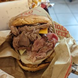 Arby's - worker  spat in my food then continue to throw my sandwich on the floor after I asked I wanted more beef
